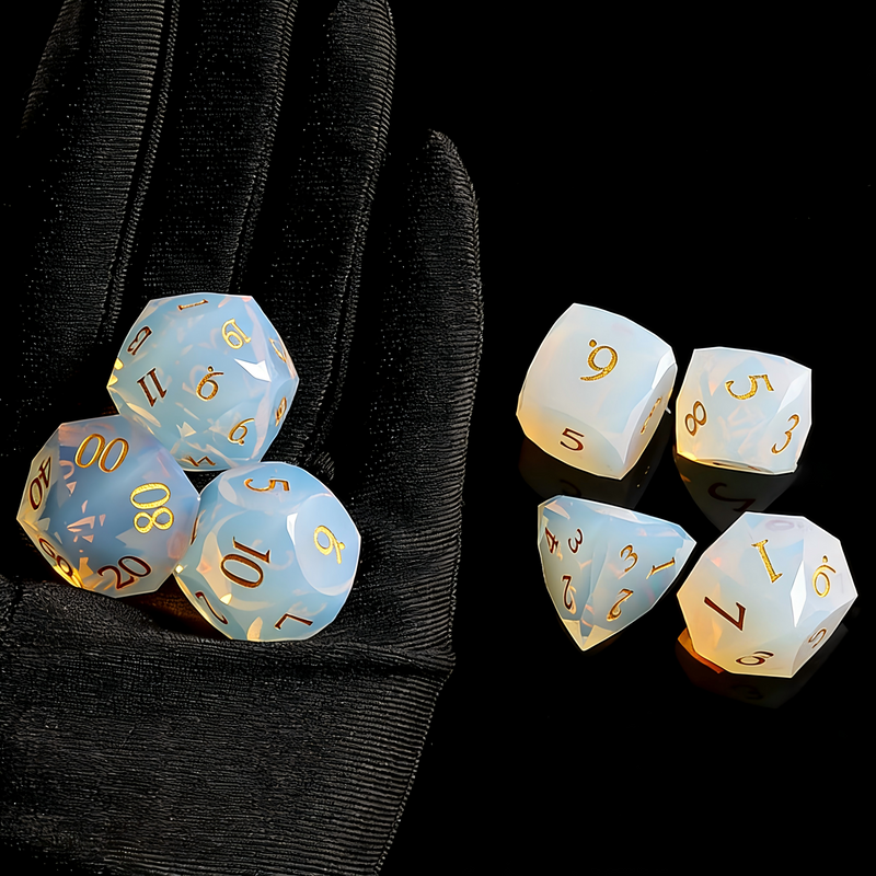 K9 crystal polyhedral dice for Dungeons and Dragons — milky white with blue-pink opalescent glow