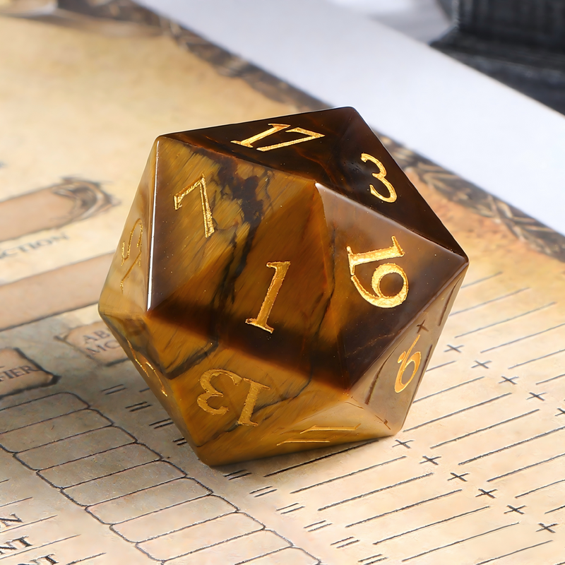 7-piece cat's eye stone DND dice set — warm golden-brown with amber chatoyant bands with chatoyant shimmer