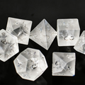 7-piece transparent frosted with gold crackle veining crystal DND dice set for tabletop RPG