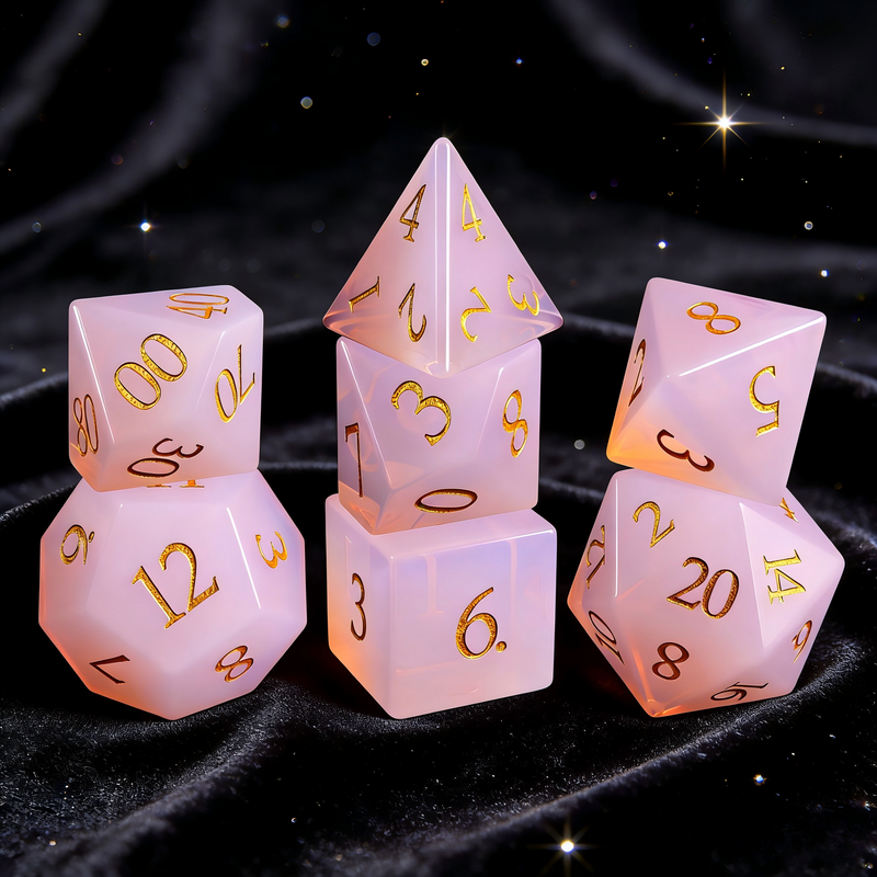 rose pink with soft milky inner glow crystal dice close-up — engraved numerals for DND