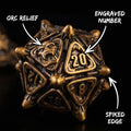 Close-up of dark iron grey with raised spike border metal D20 die for tabletop RPG