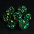K9 crystal polyhedral dice for Dungeons and Dragons — cool green with broken jade fracture pattern