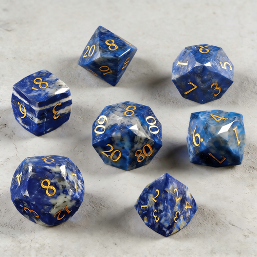 7-piece lapis lazuli DND dice set including D4 D6 D8 D10 D12 D20 — deep blue with gold veining and diamond-cut facets