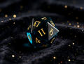K9 crystal polyhedral dice for Dungeons and Dragons — sapphire blue with prismatic diamond facets