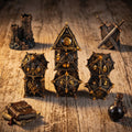 7-piece metal DND dice set — dark charcoal with golden dragon eye motifs