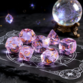 Close-up of K9 crystal D20 die — soft lavender with diamond-precision facets for tabletop RPG