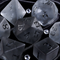 7-piece K9 crystal DND dice set — frosted gray with lightning-like internal fractures