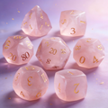 K9 crystal polyhedral dice for Dungeons and Dragons — rose pink with engineered cat's eye chatoyancy