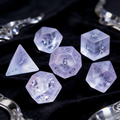 soft lavender frosted with white crackle veining crystal dice close-up — engraved numerals for DND
